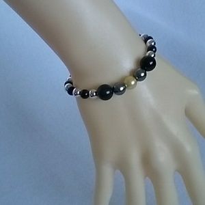 Black, gray, and yellow beaded stretch bracelet